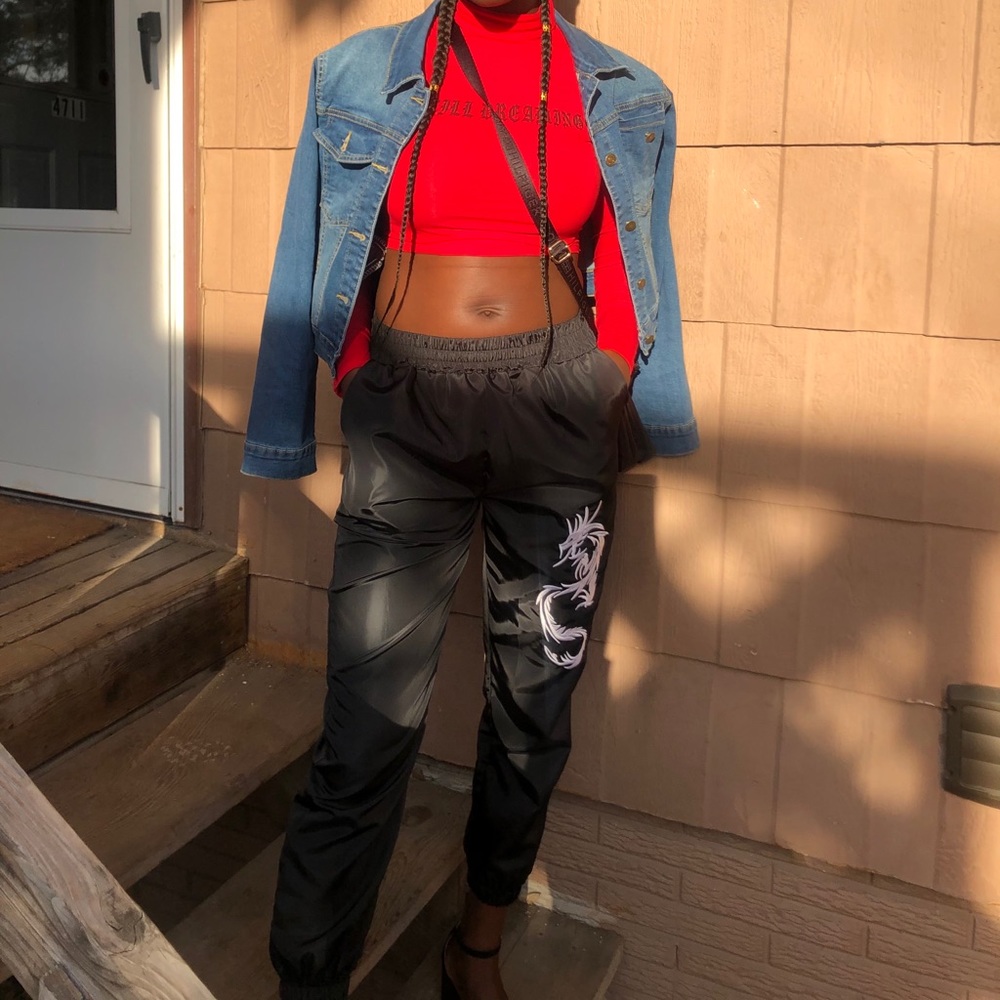 Windbreaker material pants with dragon print